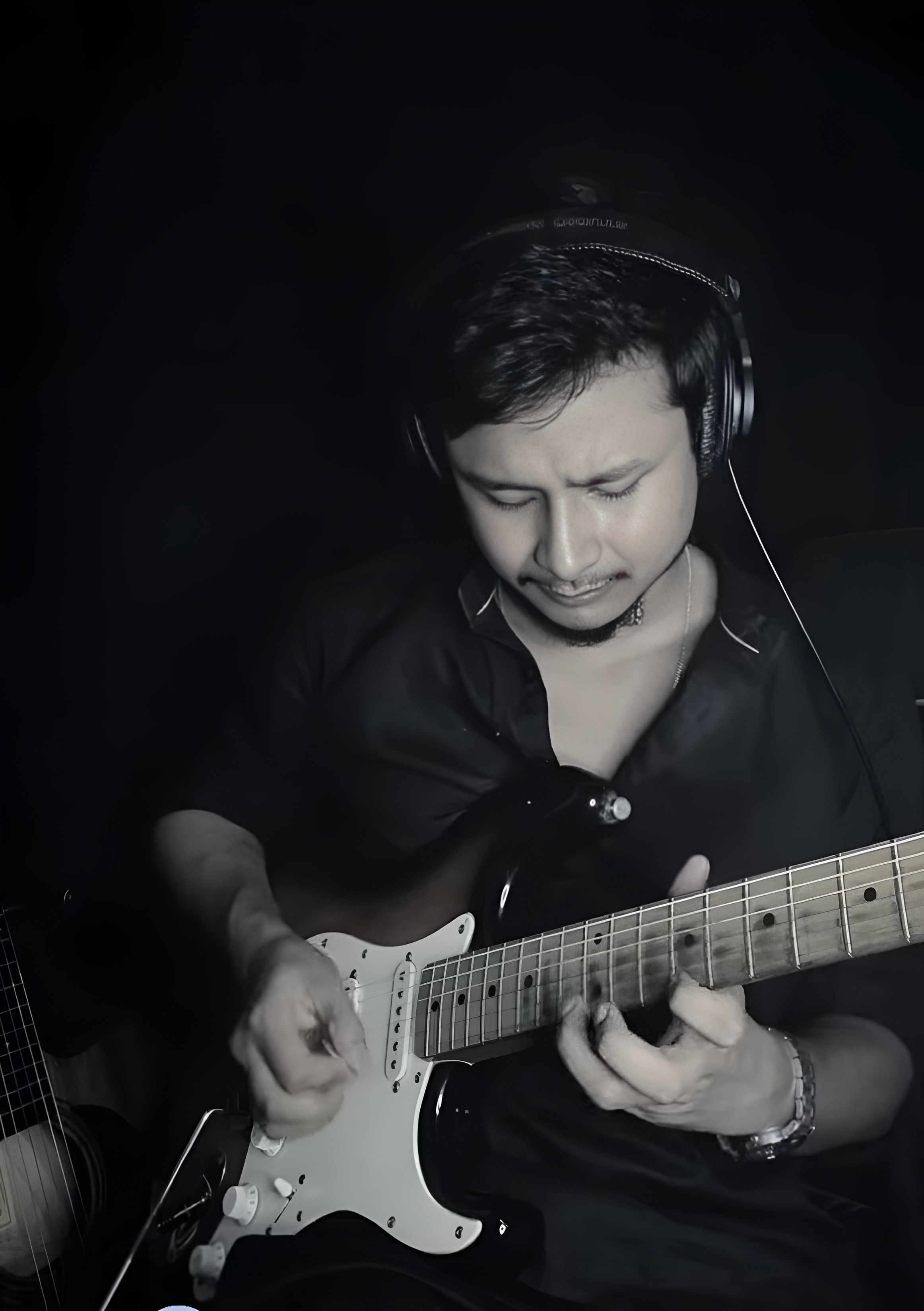 Kalyan playing guitar